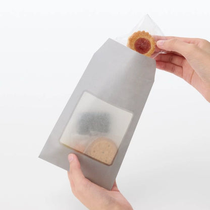 La nourriture écologique de recyclage d'impression personnalisée emporte les poignées de sac en papier kraft