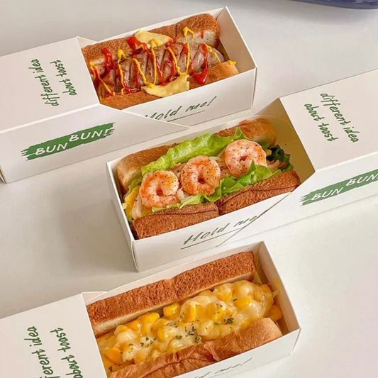 Cajas de papel de embalaje de pan tostado de dibujos animados personalizados Caja de sándwich de gota de huevo de desayuno de cartón Caja de sándwich